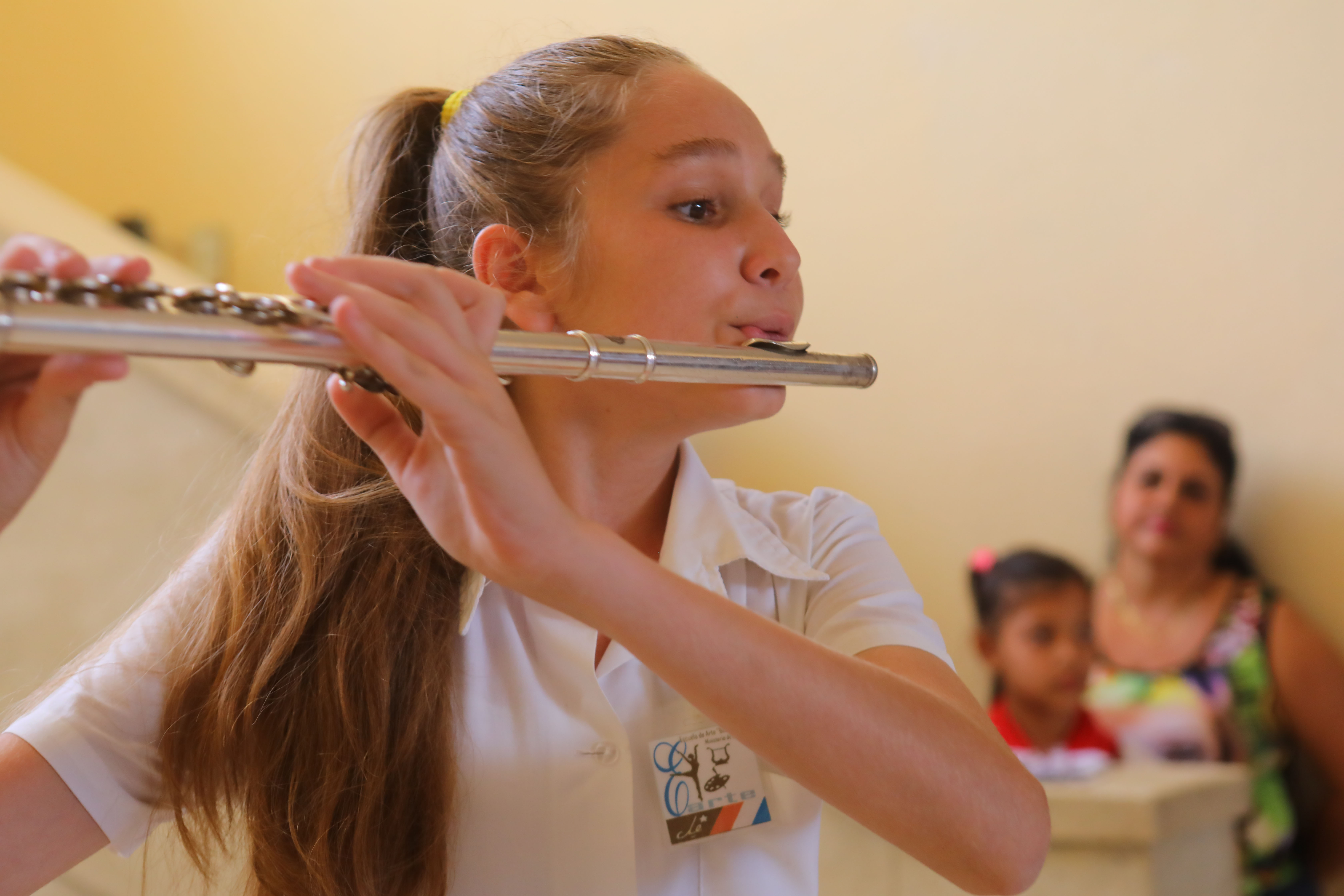 A student at Escuela de Arte Benny Moré, Cienfuegos, practicing the flute.